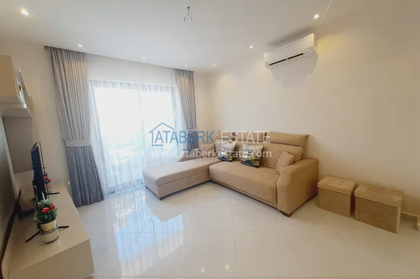 Kupuj  Apartament 1+1 z meblami i widokiem na góry w kompleksie z infrastrukturą hotelową, dzielnica Mahmutlar — Alanya  2 