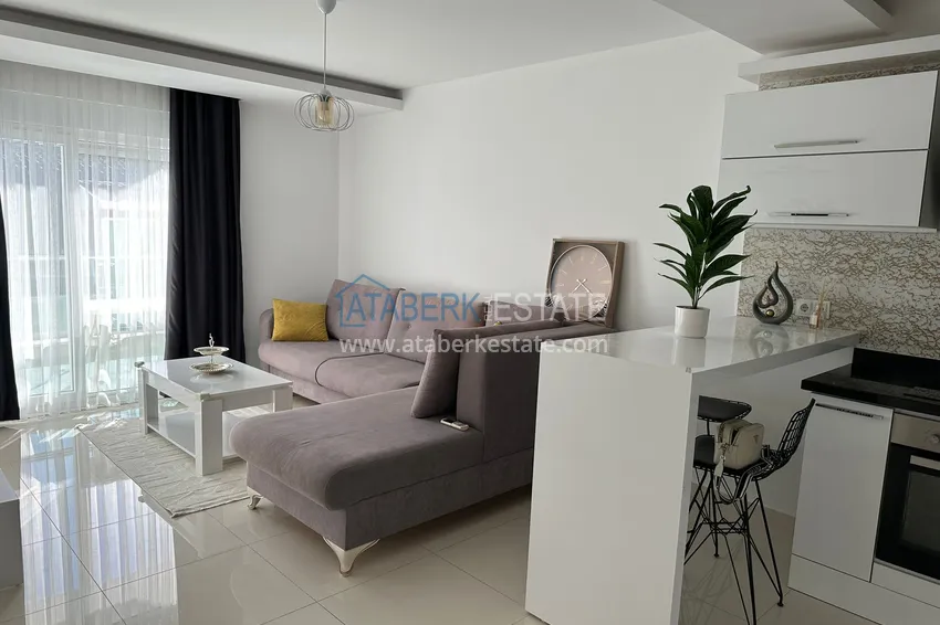 Kupuj 1+1 umeblowany apartament z widokiem na góry, centrum Alanya Plaża Kleopatra 2