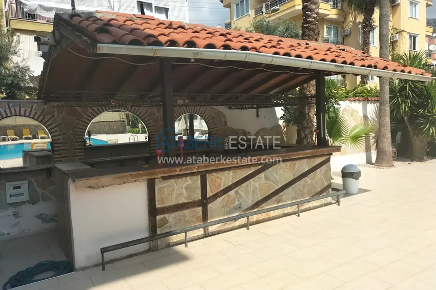 Apartament 1+1 z meblami i przeszklonym balkonem w centrum Alanyi — Plaża Kleopatra 6 