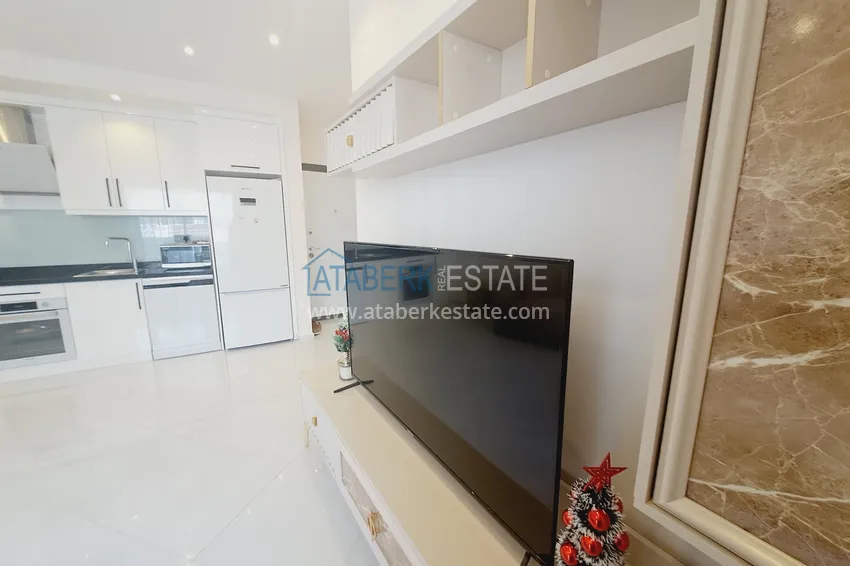 Kupuj  Apartament 1+1 z meblami i widokiem na góry w kompleksie z infrastrukturą hotelową, dzielnica Mahmutlar — Alanya  3 