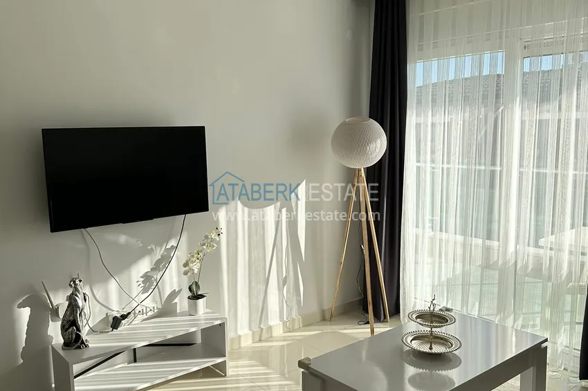 Kupuj 1+1 umeblowany apartament z widokiem na góry, centrum Alanya Plaża Kleopatra 3