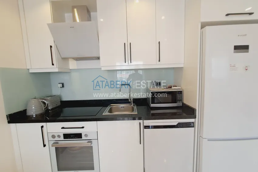 Kupuj  Apartament 1+1 z meblami i widokiem na góry w kompleksie z infrastrukturą hotelową, dzielnica Mahmutlar — Alanya  4 