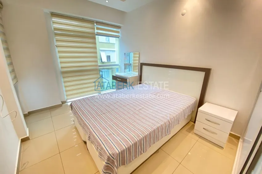 Kupuj  Apartament 1+1 z meblami i przeszklonym balkonem w centrum Alanyi — Plaża Kleopatra 4 