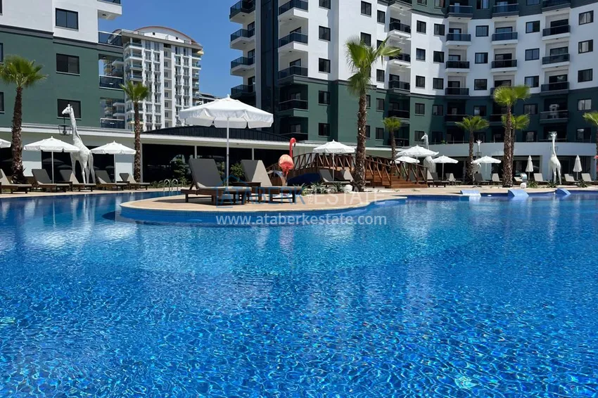 Apartament 1+1 z meblami i widokiem na góry w kompleksie z infrastrukturą hotelową, dzielnica Mahmutlar — Alanya  8 