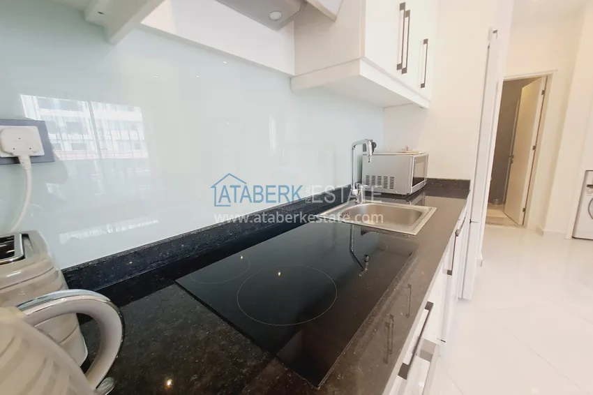 Kupuj  Apartament 1+1 z meblami i widokiem na góry w kompleksie z infrastrukturą hotelową, dzielnica Mahmutlar — Alanya  5 
