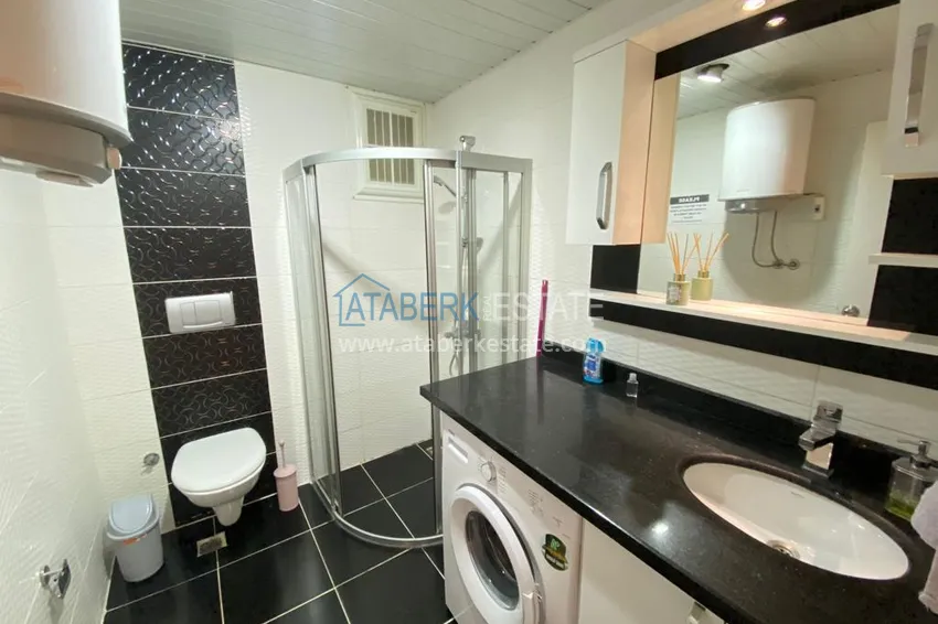 Kupuj  Apartament 1+1 z meblami i przeszklonym balkonem w centrum Alanyi — Plaża Kleopatra 5 