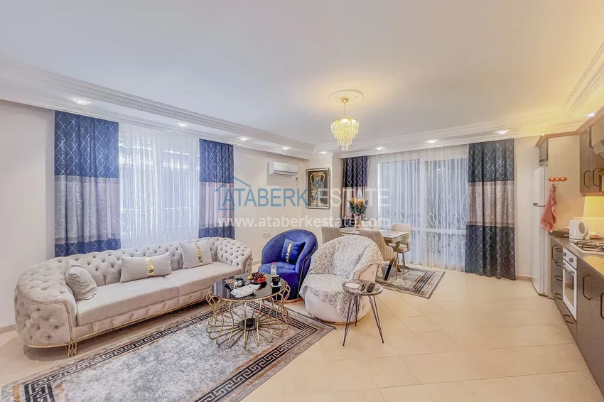 Kupuj  Apartament z dwiema sypialniami z nowymi meblami i przeszklonym balkonem w Mahmutlar 6 