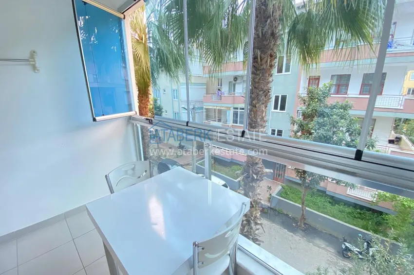 Kupuj  Apartament 1+1 z meblami i przeszklonym balkonem w centrum Alanyi — Plaża Kleopatra 6 