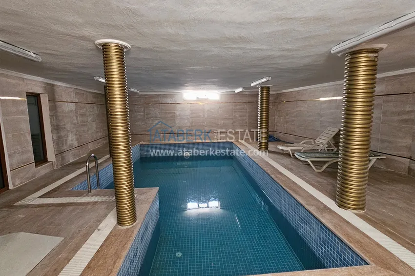 Apartament 1+1 z meblami i przeszklonym balkonem w centrum Alanyi — Plaża Kleopatra 15 