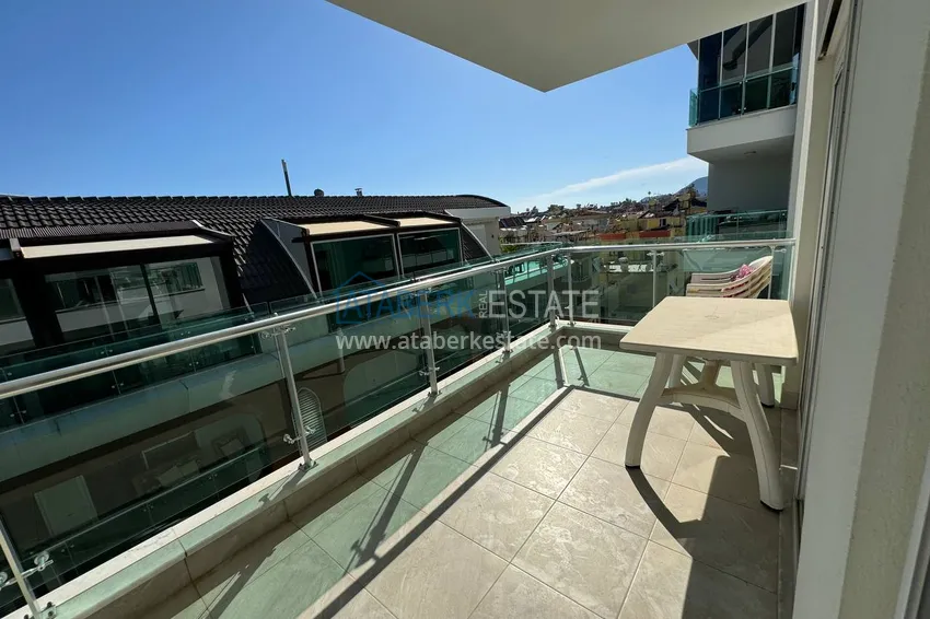 Kupuj 1+1 umeblowany apartament z widokiem na góry, centrum Alanya Plaża Kleopatra 7