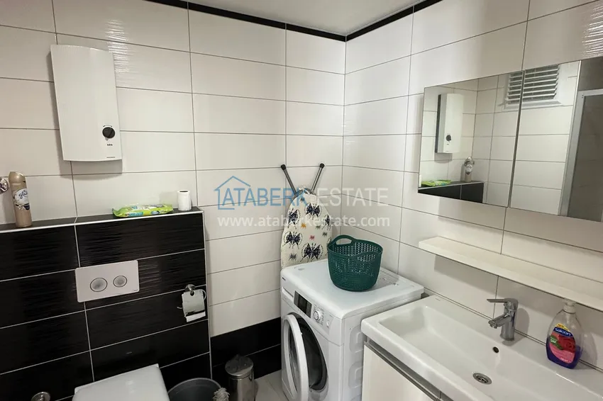 Kupuj  Nieruchomość na zezwolenie na pobyt! Apartament 1+1 z meblami i widokiem na góry, dzielnica Cikcilli — Alanya 9 