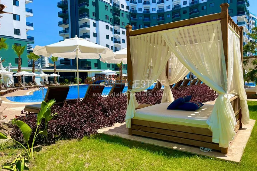 Apartament 1+1 z meblami i widokiem na góry w kompleksie z infrastrukturą hotelową, dzielnica Mahmutlar — Alanya  11 