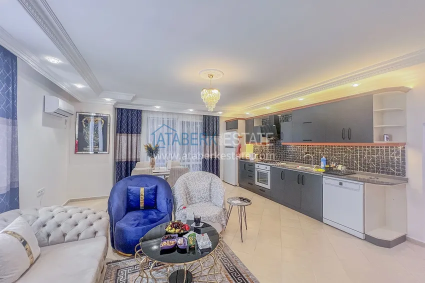 Kupuj  Apartament z dwiema sypialniami z nowymi meblami i przeszklonym balkonem w Mahmutlar 8 