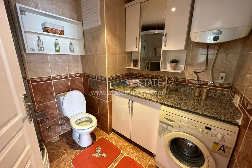 Kupuj  Apartament z jedną sypialnią pod klucz w przytulnym kompleksie w dzielnicy Alanya Tosmur 10 