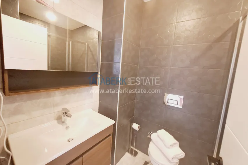 Kupuj  Apartament 1+1 z meblami i widokiem na góry w kompleksie z infrastrukturą hotelową, dzielnica Mahmutlar — Alanya  9 