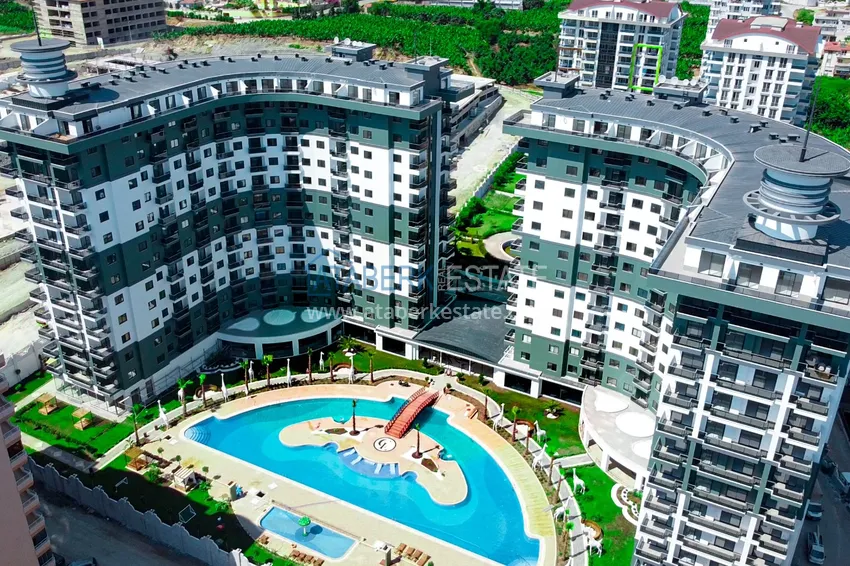 Umeblowany apartament z jedną sypialnią w kompleksie z infrastrukturą hotelową, dzielnica Mahmutlar — Alanya  1 
