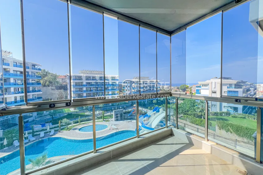 Kupuj  Apartament 1+1 z przeszklonym balkonem i widokiem na morze, dzielnica Kargicak — Alanya 10 