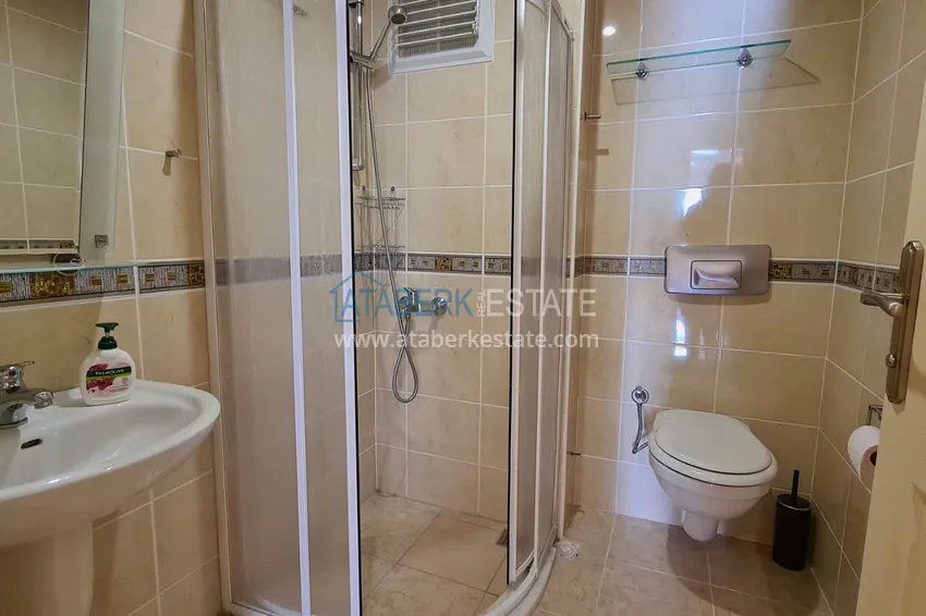 Kupuj  Apartament 2+1 z meblami i przeszklonym balkonem zaledwie 300 metrów od morza, dzielnica Oba - Alanya 12 