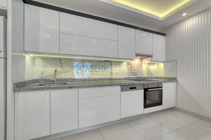 Kupuj  Apartament pod klucz z dwiema sypialniami w Mahmutlar w nowoczesnym kompleksie 10 