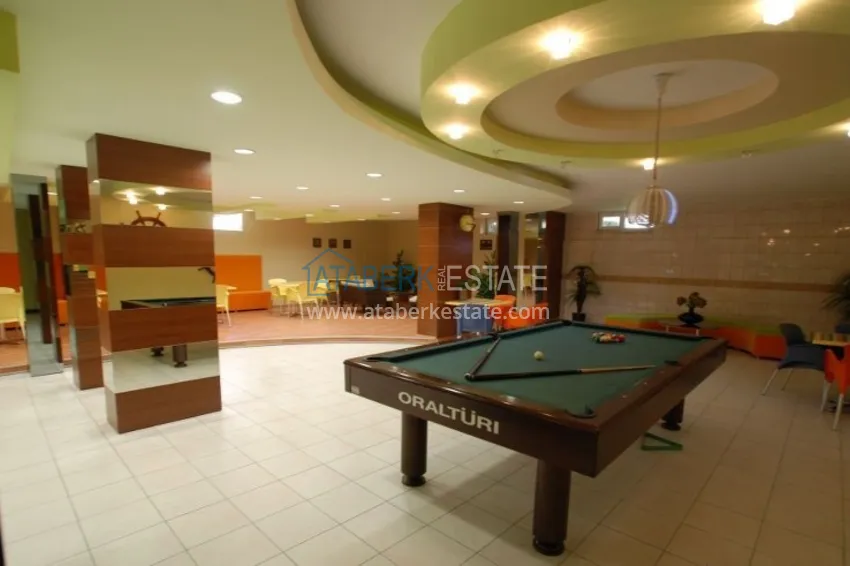 Apartament 2+1 z meblami i przeszklonym balkonem zaledwie 300 metrów od morza, dzielnica Oba - Alanya 13 