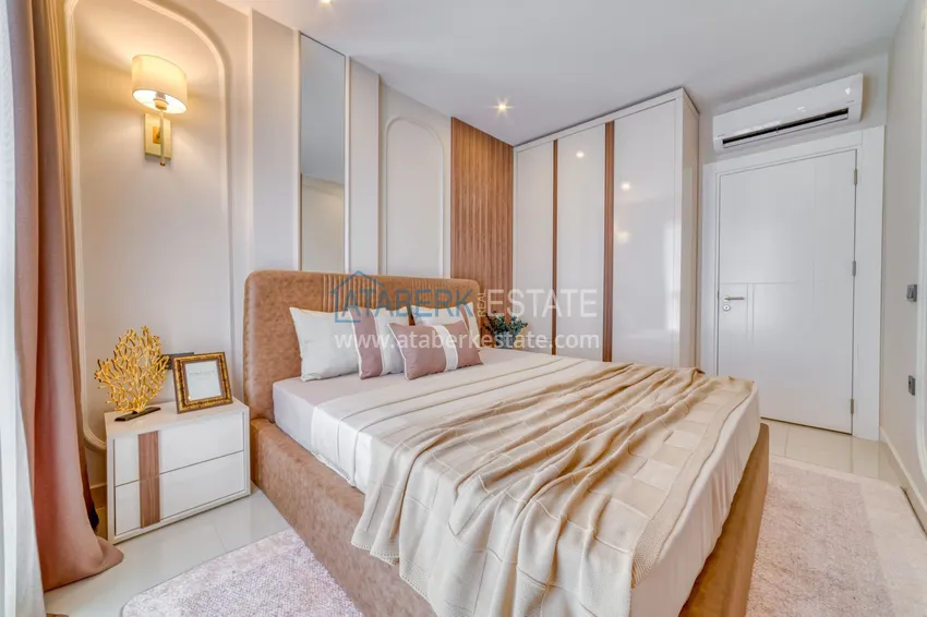 Kupuj  Apartament pod klucz z dwiema sypialniami w Mahmutlar w nowoczesnym kompleksie 13 