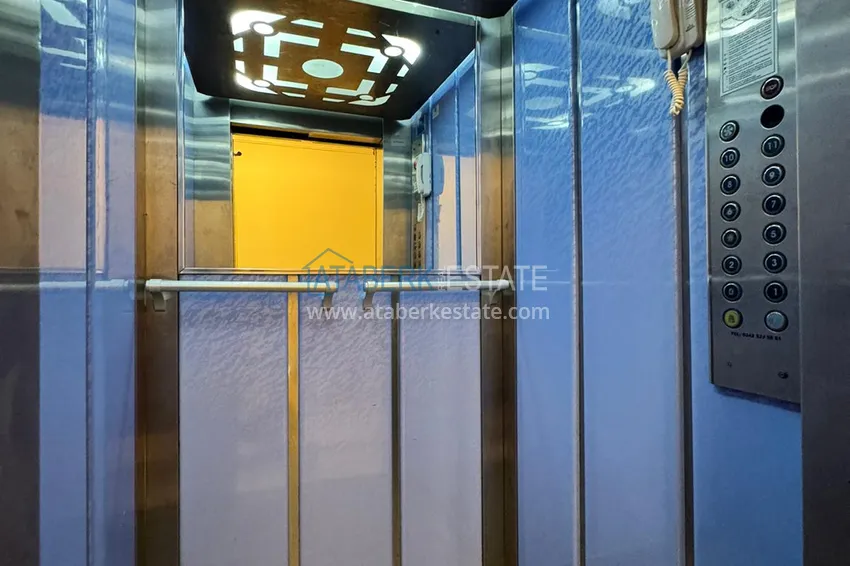 Apartament w Mahmutlar częściowo umeblowany z przeszklonym balkonem i widokiem na morze 15 