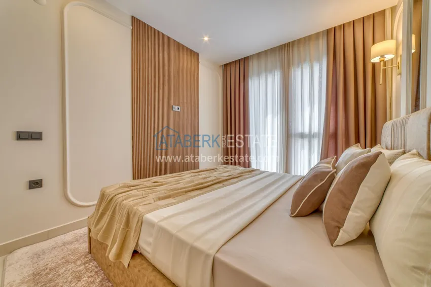 Kupuj  Apartament pod klucz z dwiema sypialniami w Mahmutlar w nowoczesnym kompleksie 16 