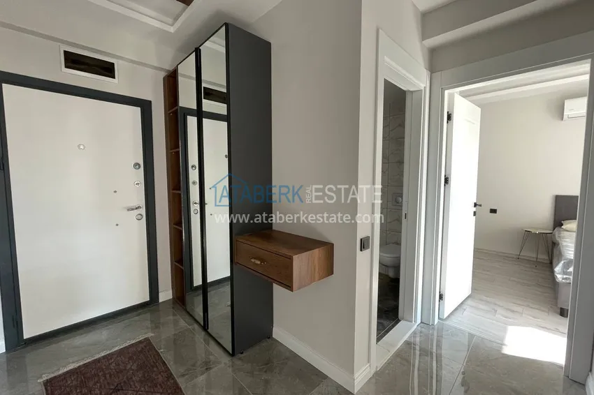 Kupuj  Jednopokojowy apartament z nowymi meblami, oddzielną kuchnią i 2 balkonami w Mersin, Tomyuk  1 