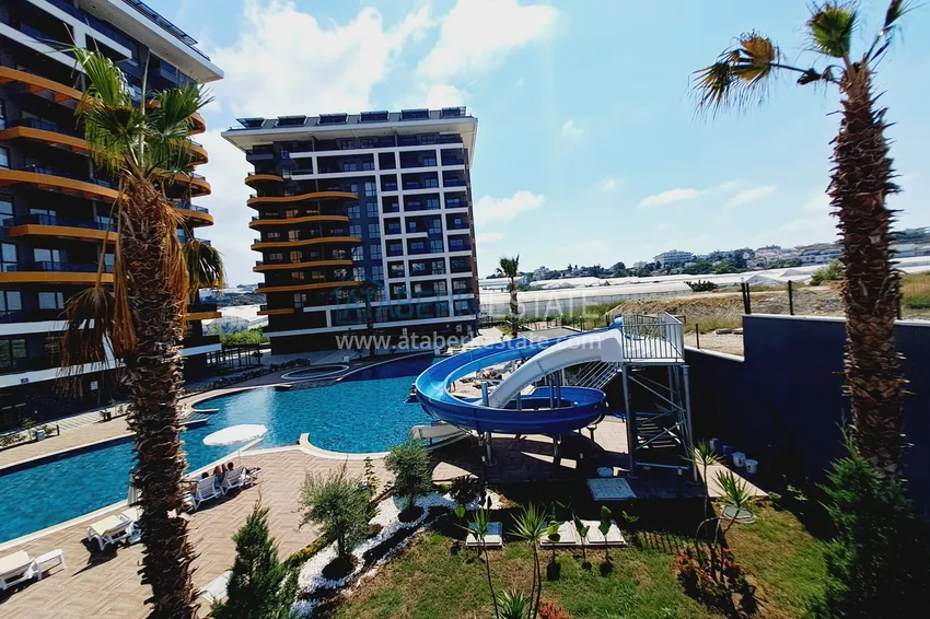 Nowe budynki w Alanyi! Apartament 1+1 z częściowym widokiem na morze, dzielnica Avsallar — Alanya 1 