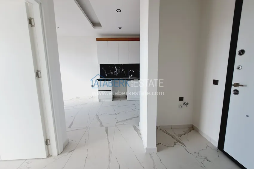 Kupuj  Nowe budynki w Alanyi! Apartament 1+1 z częściowym widokiem na morze, dzielnica Avsallar — Alanya 1 