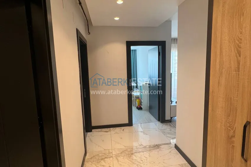 Kupuj  Stylowy apartament z 2 sypialniami i widokiem na góry w centrum Teje, Mersin 1 