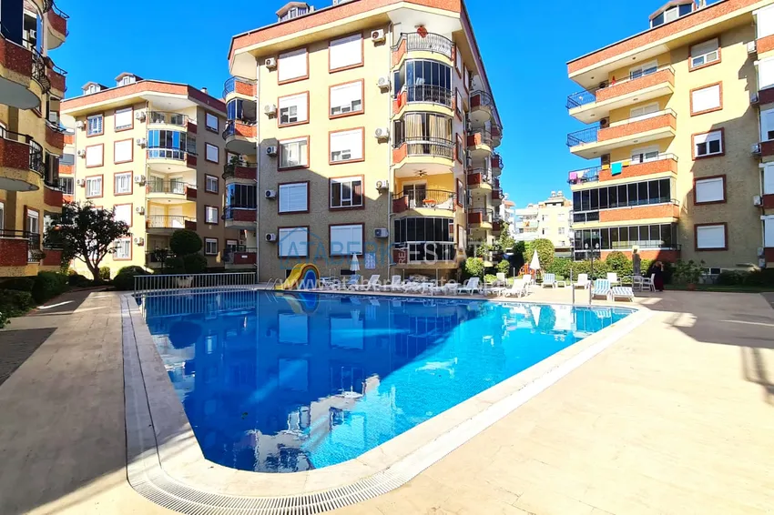 Apartament 2+1 z meblami i przeszklonym balkonem zaledwie 300 metrów od morza, dzielnica Oba - Alanya 1 