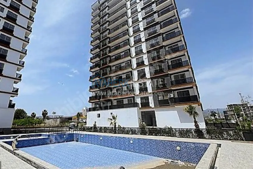 1+1 mieszkania w nowym kompleksie mieszkalnym 400 metrów od morza w rejonie Arpachbakhshish — Mersin 1 