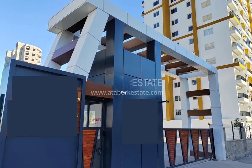 Jednopokojowy apartament z nowymi meblami, oddzielną kuchnią i 2 balkonami w Mersin, Tomyuk  4 