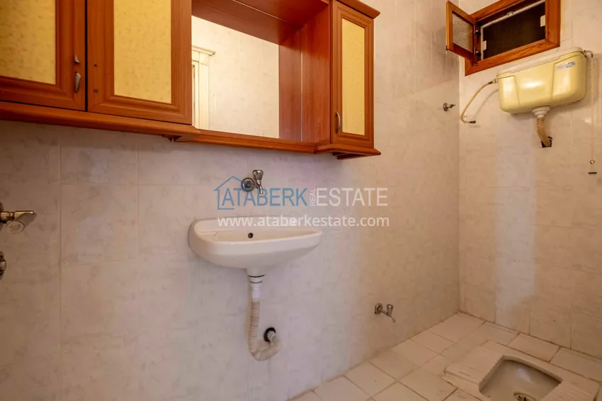 Kupuj  Dwupokojowy apartament w centrum Mahmutlar z widokiem na góry 18 