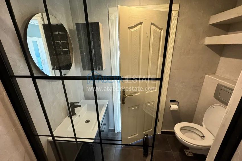 Kupuj  Apartament w Mahmutlar częściowo umeblowany z przeszklonym balkonem i widokiem na morze 22 