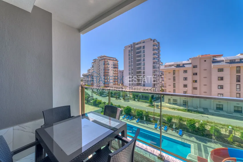 Kupuj  Apartament pod klucz z dwiema sypialniami w Mahmutlar w nowoczesnym kompleksie 23 