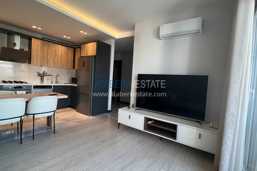 Kupuj  Stylowy apartament z 2 sypialniami i widokiem na góry w centrum Teje, Mersin 2 