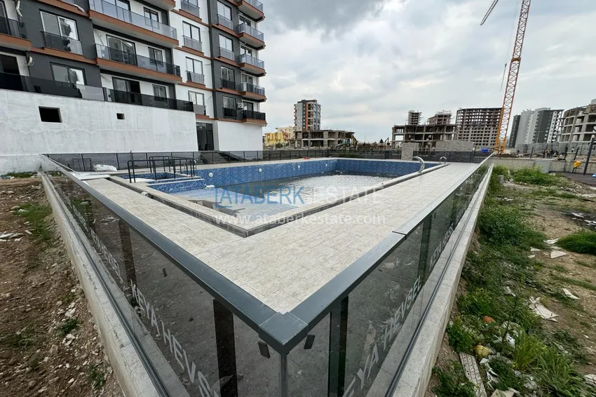 1+1 mieszkania w nowym kompleksie mieszkalnym 400 metrów od morza w rejonie Arpachbakhshish — Mersin 2 