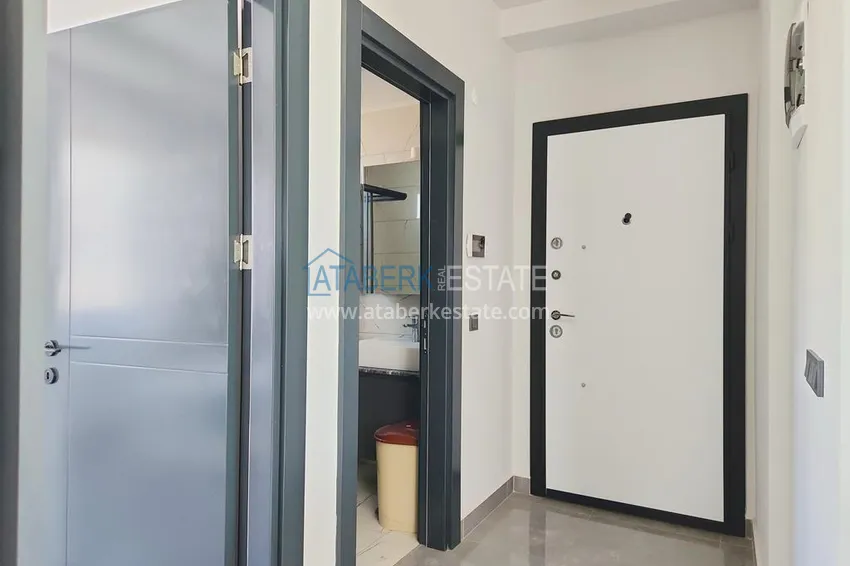 Kupuj  Apartament 1+1 z meblami i przeszklonym balkonem, dzielnica Oba — Alanya 2 
