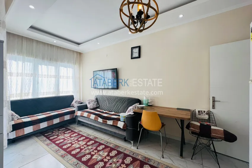 Kupuj  Jednopokojowy apartament w centrum Alanyi, umeblowany. Nadaje się do zezwolenia na pobyt 3 