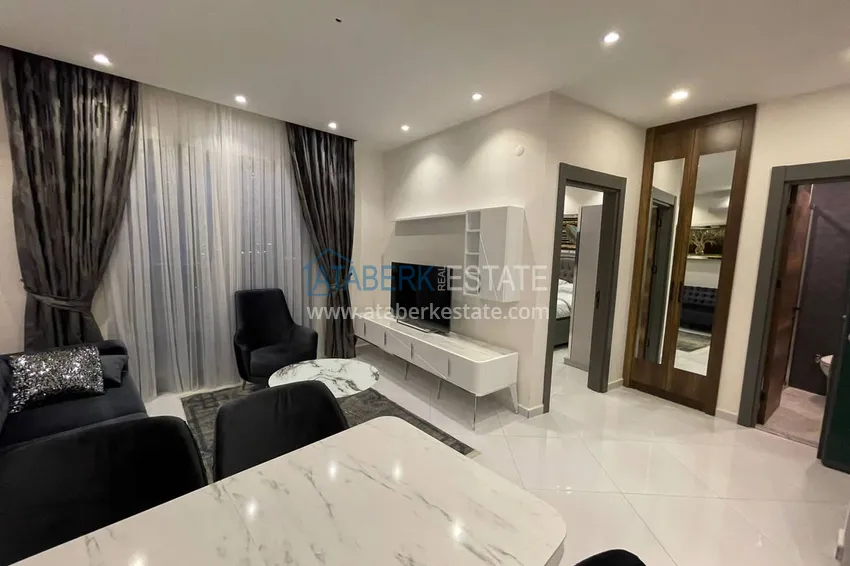 Kupuj  Umeblowany apartament z jedną sypialnią w kompleksie z infrastrukturą hotelową, dzielnica Mahmutlar — Alanya  3 