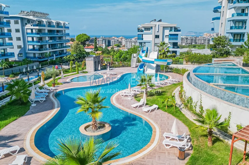 Apartament 1+1 z przeszklonym balkonem i widokiem na morze, dzielnica Kargicak — Alanya 3 