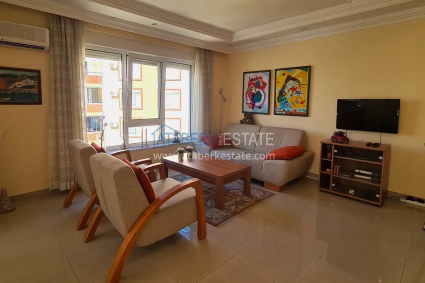 Kupuj  Apartament 2+1 z meblami i przeszklonym balkonem zaledwie 300 metrów od morza, dzielnica Oba - Alanya 3 