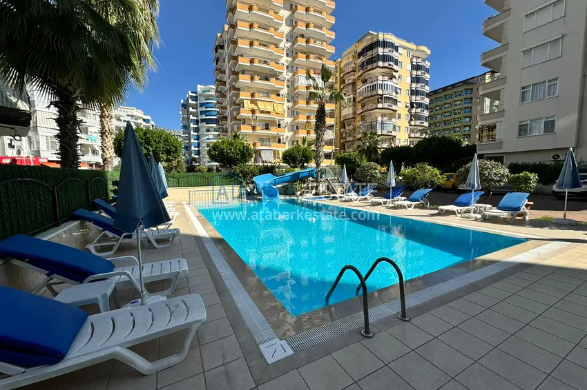 Apartament w Mahmutlar częściowo umeblowany z przeszklonym balkonem i widokiem na morze 6 