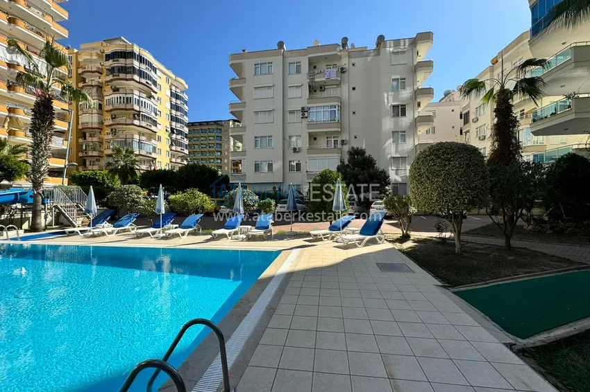 Apartament w Mahmutlar częściowo umeblowany z przeszklonym balkonem i widokiem na morze 7 