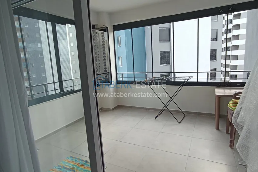 Kupuj  Przestronny apartament 1+1 z widokiem na morze i 2 przeszklonymi balkonami w Mersin, Arpacbakhshish 9 