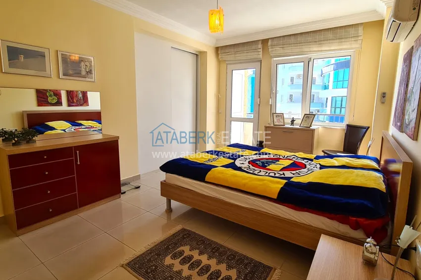 Kupuj  Apartament 2+1 z meblami i przeszklonym balkonem zaledwie 300 metrów od morza, dzielnica Oba - Alanya 11 