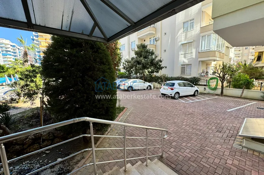 Apartament w Mahmutlar częściowo umeblowany z przeszklonym balkonem i widokiem na morze 10 