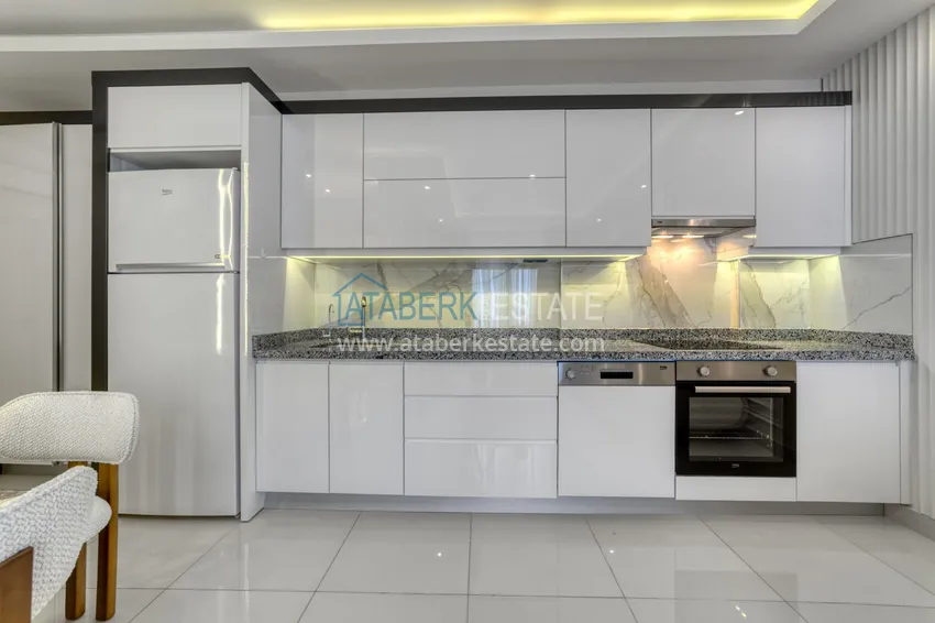 Kupuj  Apartament pod klucz z dwiema sypialniami w Mahmutlar w nowoczesnym kompleksie 9 